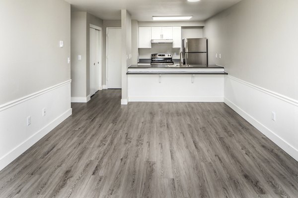 Spacious living room with modern furnishings at Avana at Happy Valley Apartments