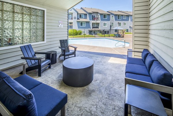 Stylish pool and patio area at Avana at Happy Valley Apartments, ideal for relaxation and outdoor gatherings in a luxury setting