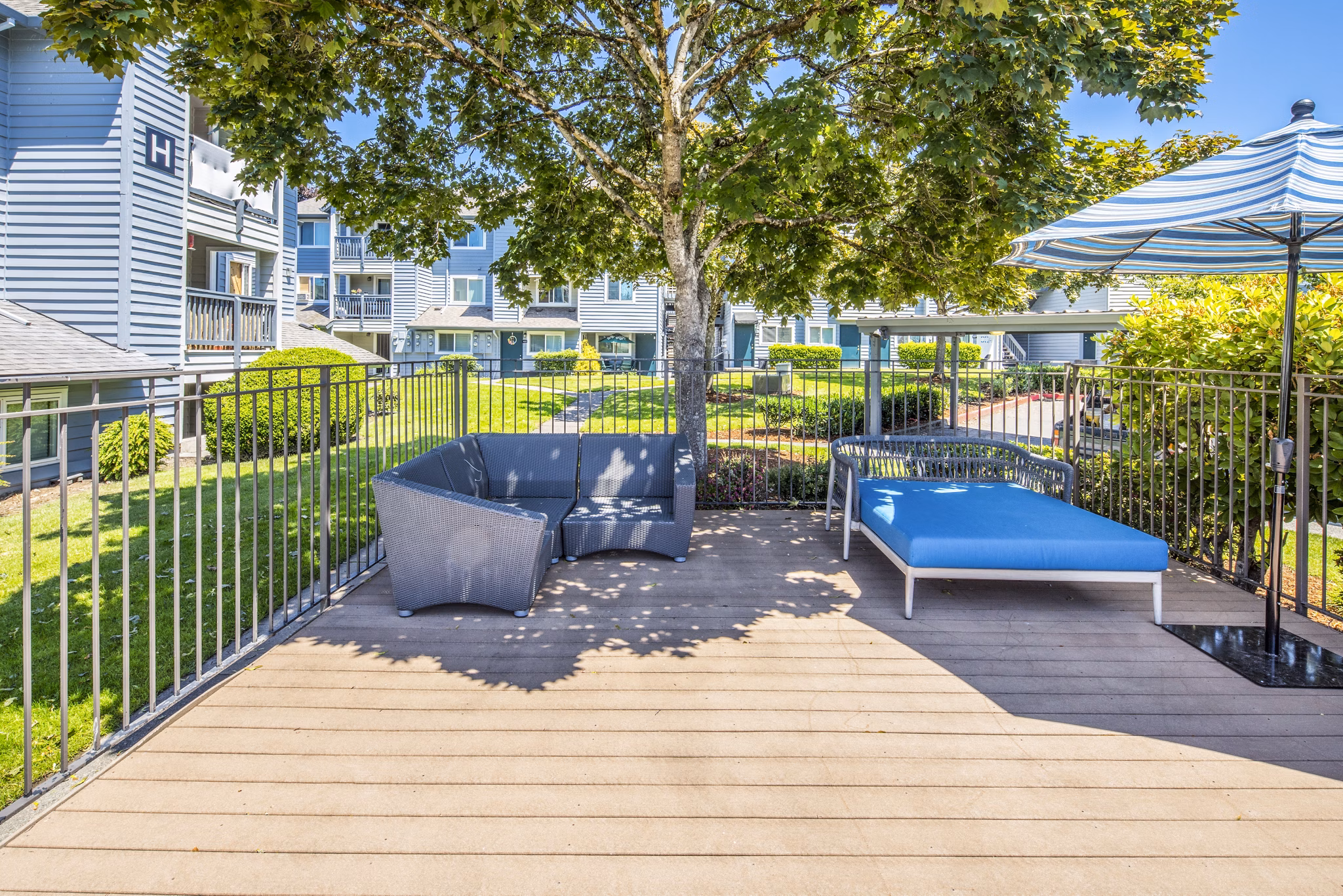 Outdoor patio with stylish seating at Avana at Happy Valley Apartments, perfect for relaxation and socializing