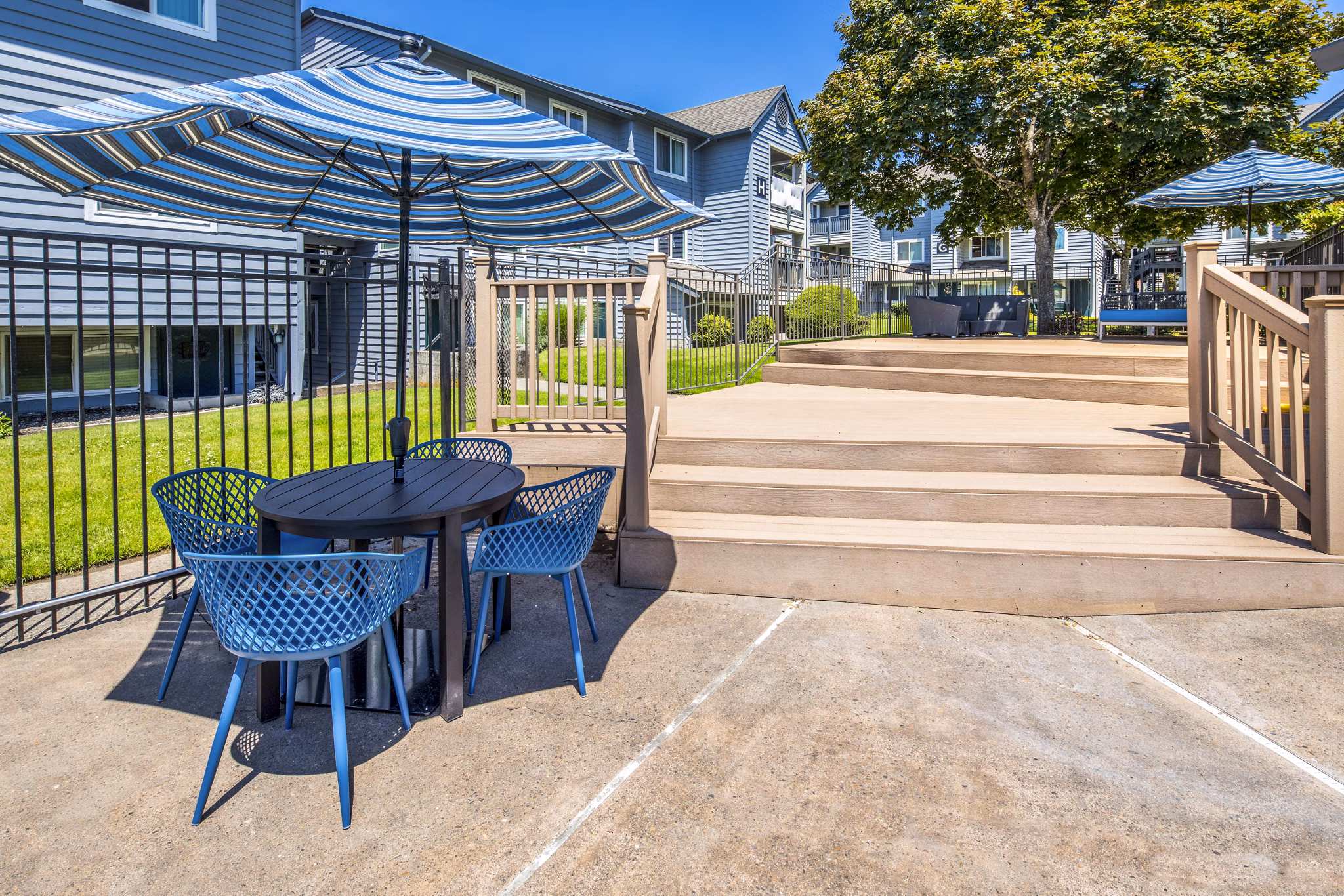 Patio area featuring stylish outdoor seating at Avana at Happy Valley Apartments