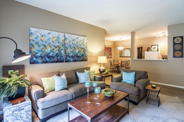 Modern living room with stylish furnishings in Estancia at City Center Apartments