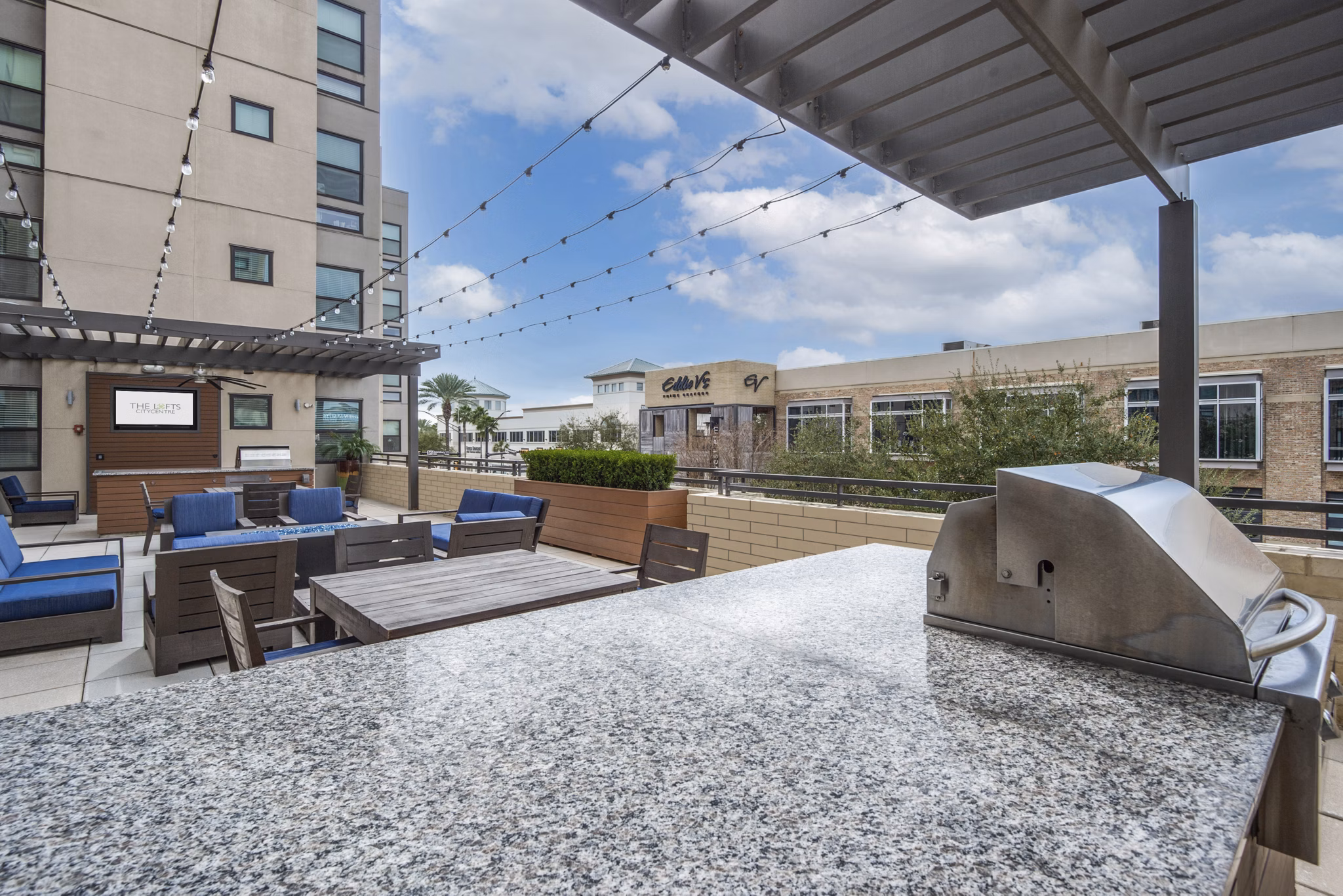 grill area/patio at The Lofts at City Centre Apartments