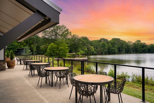 Charming patio with outdoor seating at Homestead at Hartness Apartments
