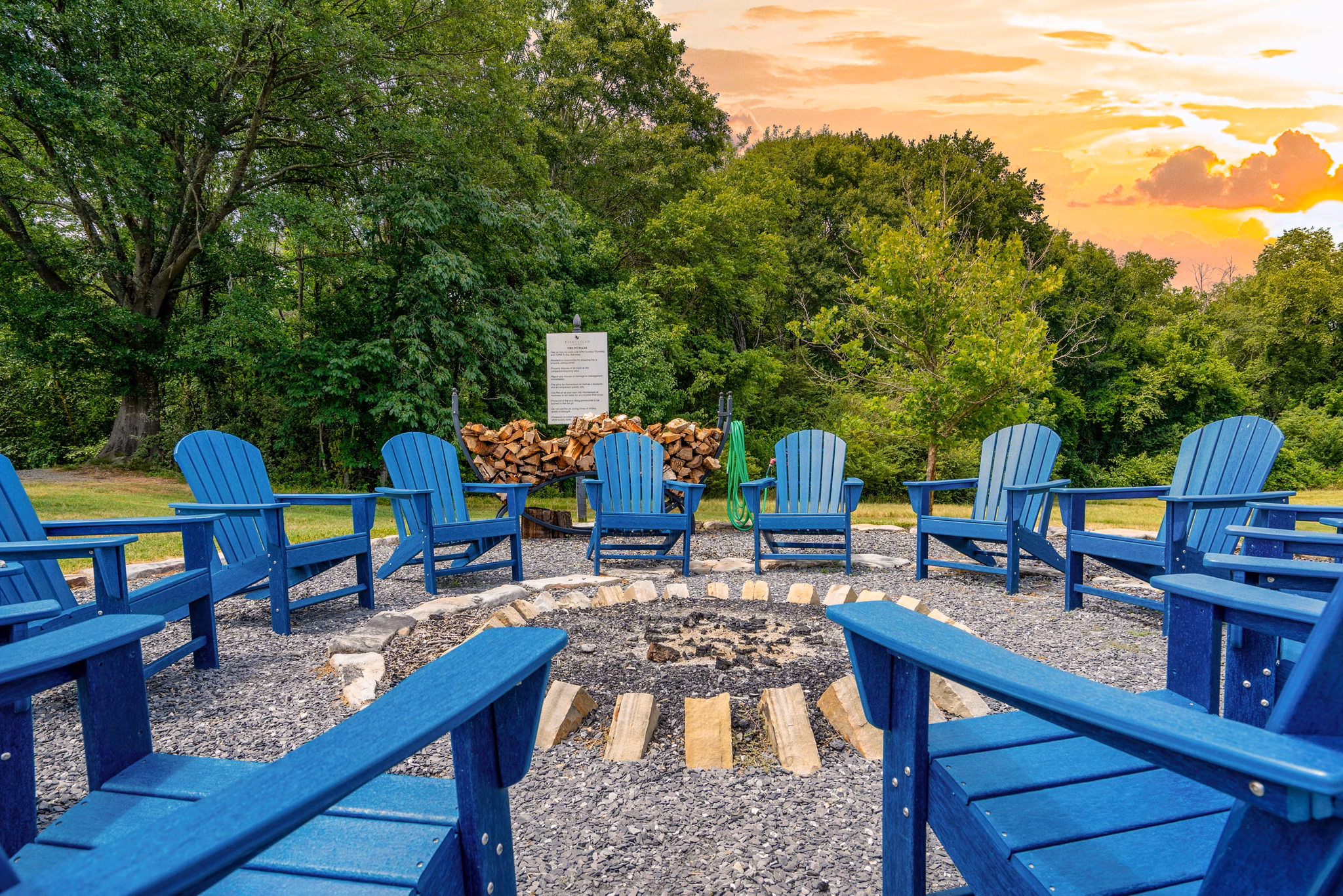 Cozy outdoor fire pit area at Homestead at Hartness Apartments