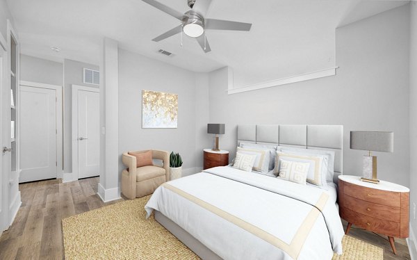 Elegant bedroom with modern decor at The Boulevard Apartments