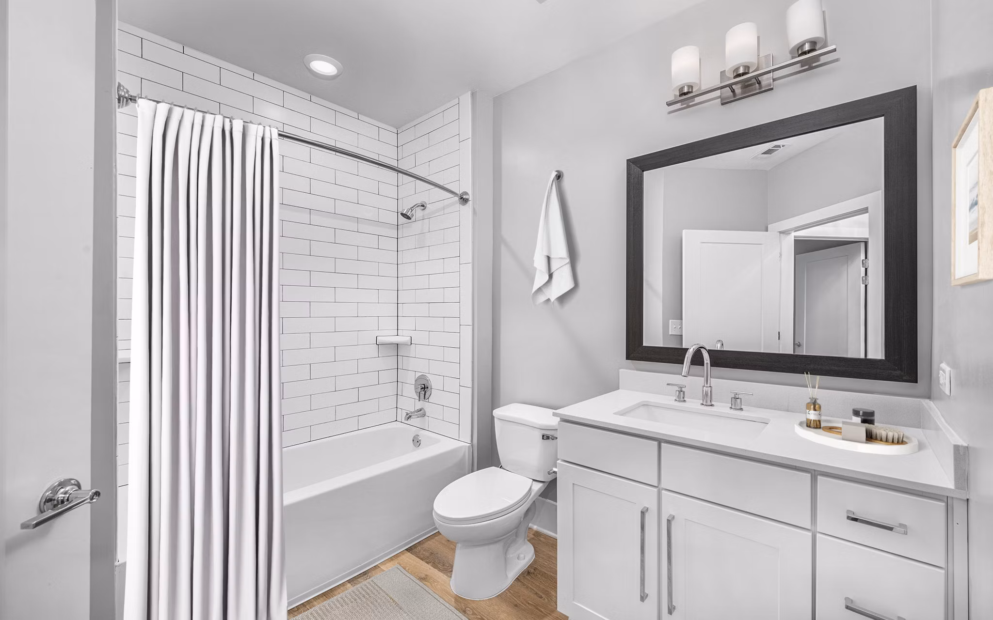 Elegant bathroom with marble countertops at The Boulevard Apartments, offering luxury living and modern design