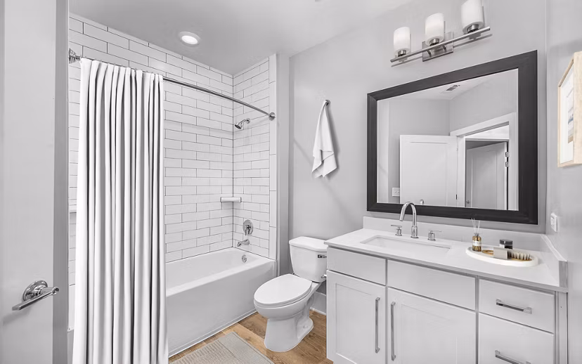 Elegant bathroom with marble countertops at The Boulevard Apartments, offering luxury living and modern design