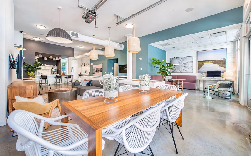 Modern clubhouse with communal seating and game area at The Boulevard Apartments