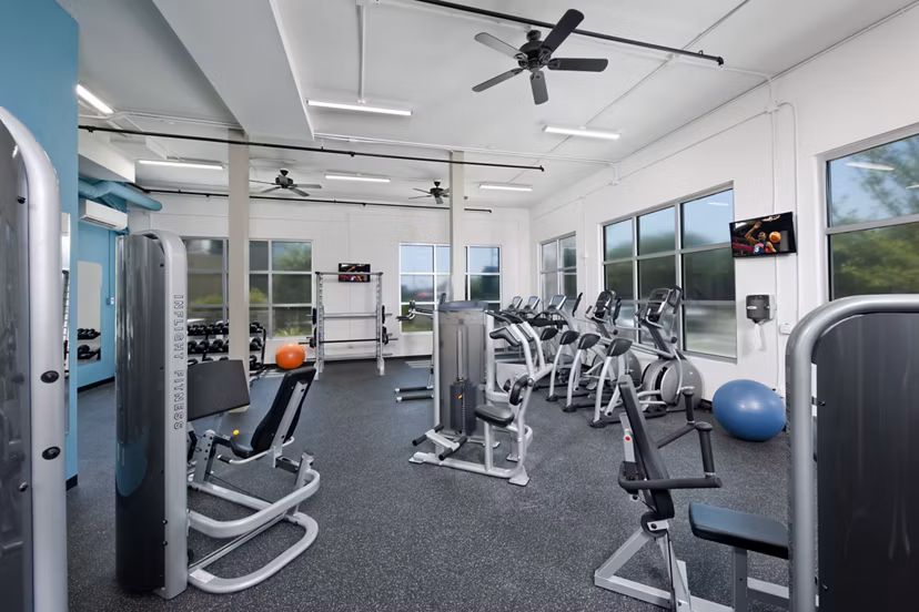 State-of-the-art fitness center at The Boulevard Apartments featuring modern exercise machines