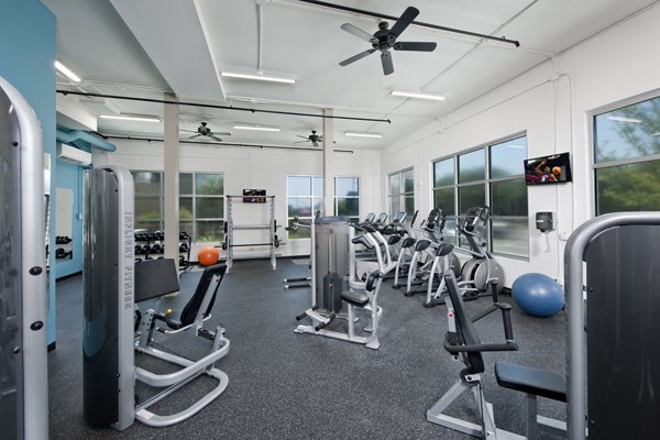 State-of-the-art fitness center at The Boulevard Apartments featuring modern exercise machines