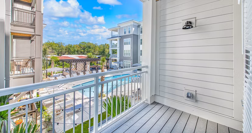 Open-air patio with cozy seating at The Boulevard Apartments