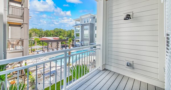 Open-air patio with cozy seating at The Boulevard Apartments