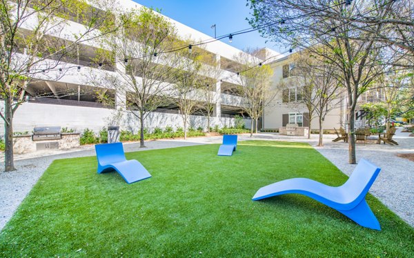 Courtyard with lush greenery at The Boulevard Apartments offering a tranquil retreat in luxury urban living