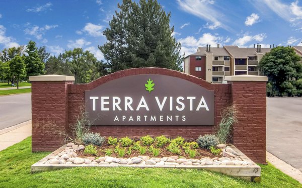 Signage at Terra Vista at the Park Apartments located in a vibrant urban area, promoting luxury living with modern amenities