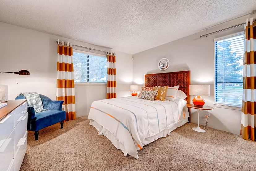 Bedroom with modern decor at Terra Vista at the Park Apartments featuring luxury design and spacious layout