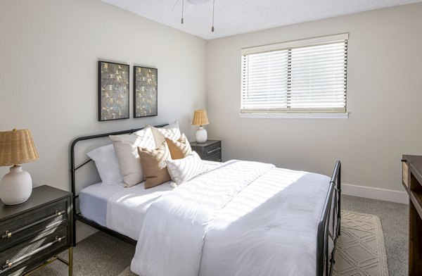 Inviting bedroom with stylish decor in Terra Vista at the Park Apartments, showcasing luxury living with modern design and comfort