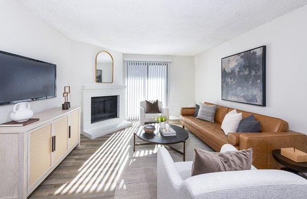 Spacious living room with modern decor at Terra Vista at the Park Apartments
