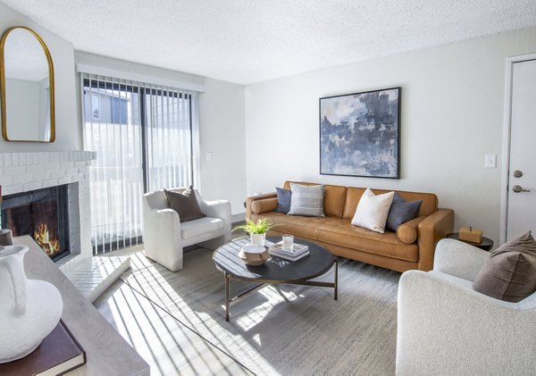 Living room with modern decor and natural light at Terra Vista at the Park Apartments