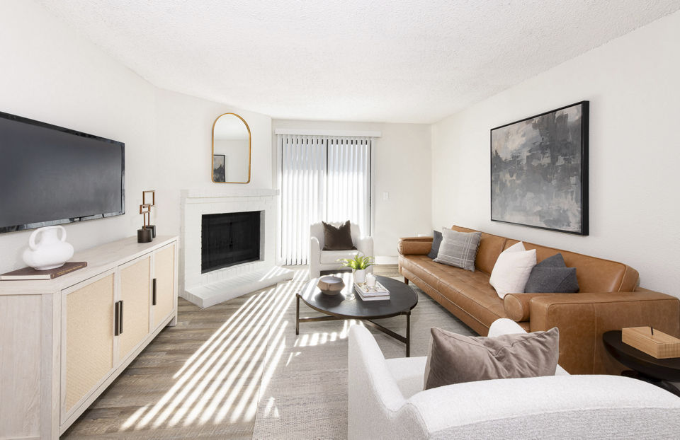 Living room with modern decor and natural light at Terra Vista at the Park Apartments