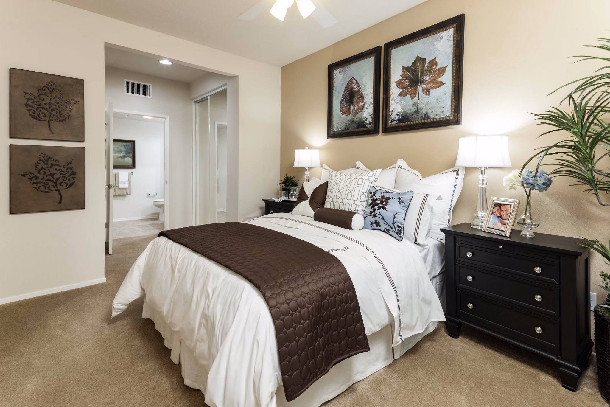 Modern bedroom with river views in Overture Riverwalk Apartments