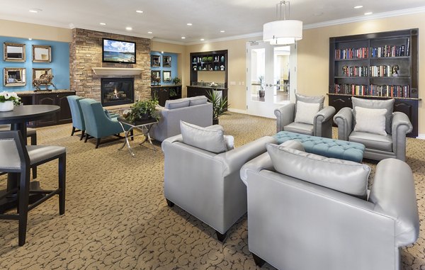 Clubhouse library featuring cozy reading nooks at Overture Riverwalk luxury apartments
