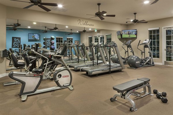 Fitness center with modern equipment at Overture Riverwalk Apartments
