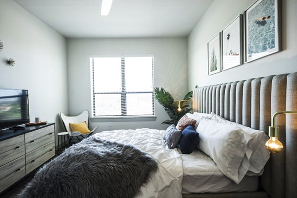 Modern bedroom with elegant decor at Corazon Apartments, a luxury Greystar property