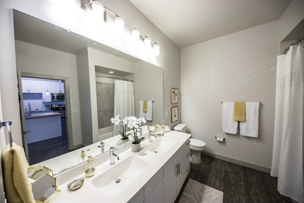 Modern bathroom with elegant fixtures at Corazon Apartments