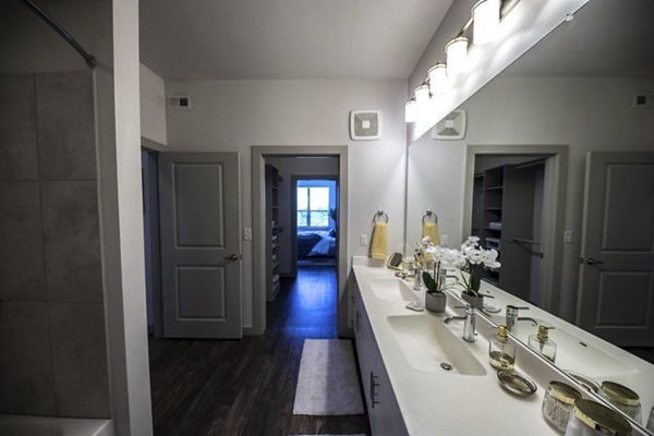 Luxurious bathroom with modern fixtures at Corazon Apartments