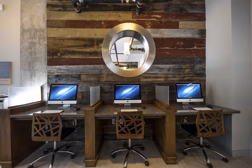 Stylish clubhouse with modern seating at Corazon Apartments