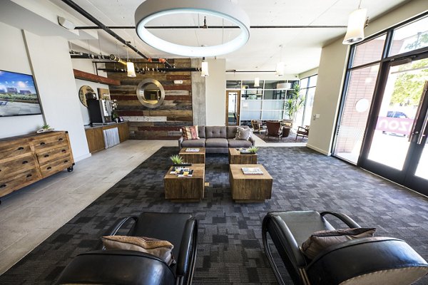 Clubhouse featuring modern design and cozy seating at Corazon Apartments in Austin