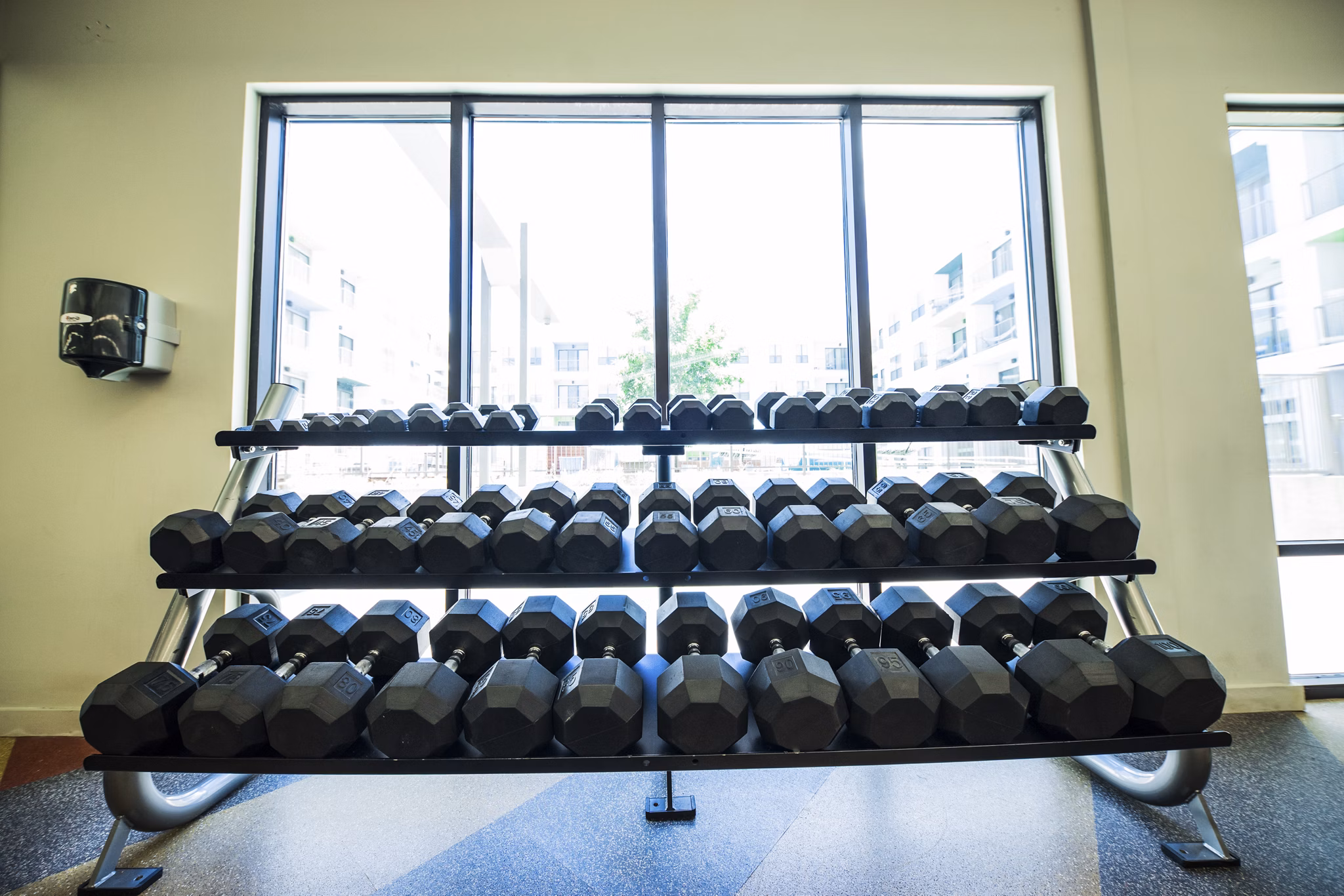 Modern fitness center with state-of-the-art equipment at Corazon Apartments