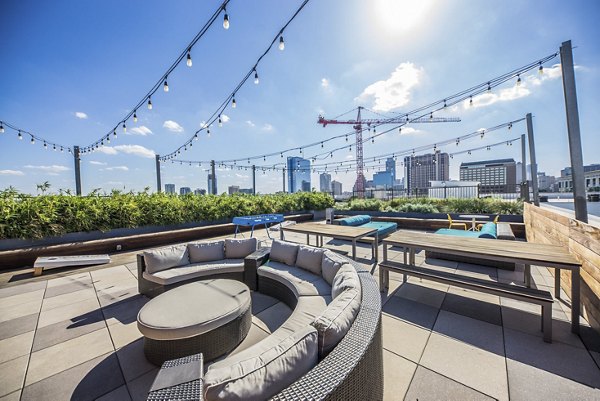 Scenic rooftop deck at Corazon Apartments offering city skyline views