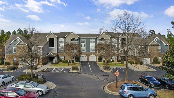 Luxury apartment complex featuring parking spaces in a vibrant community