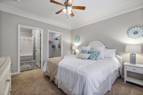 Elegant bedroom with modern decor at Braxton at Brier Creek Apartments