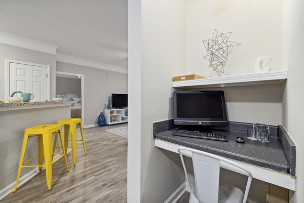 Stylish kitchen with stainless appliances in Braxton at Brier Creek Apartments
