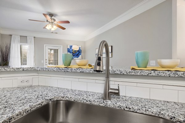 Spacious kitchen with modern appliances at Braxton at Brier Creek Apartments