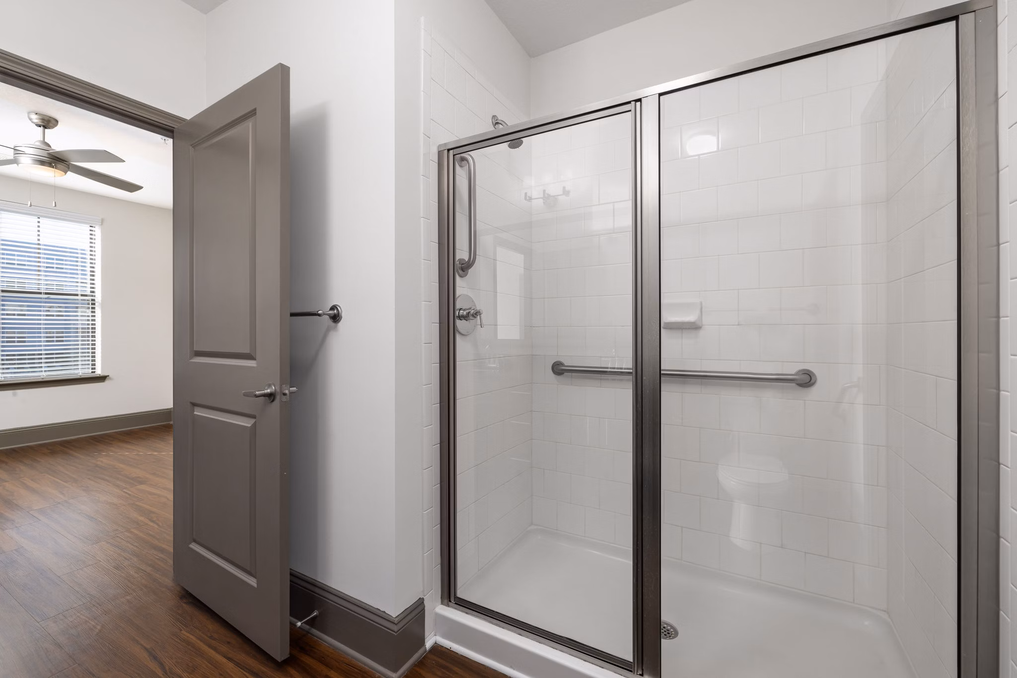 Bathroom featuring sleek fixtures and modern design at Midtown Green Apartments