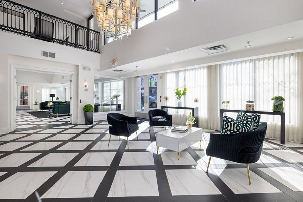 Inviting clubhouse with modern decor at Midtown Green Apartments, ideal for social gatherings and relaxation