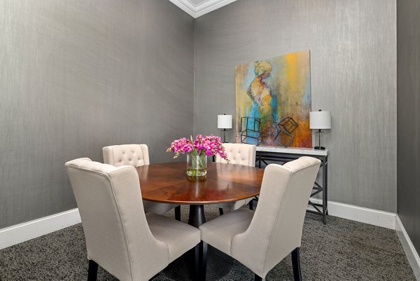 Elegant community clubhouse with modern furnishings at Midtown Green Apartments, perfect for socializing and relaxation