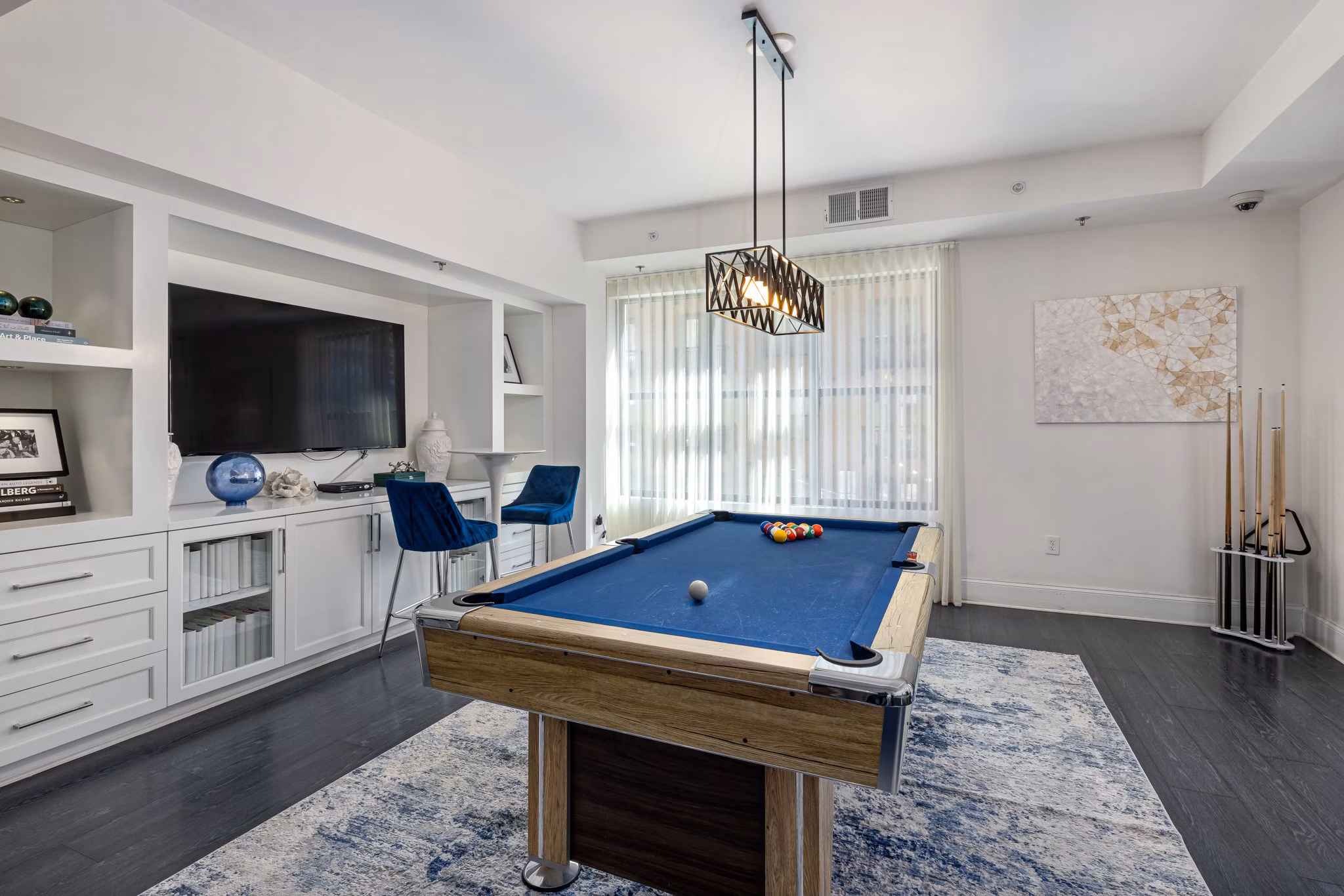Clubhouse featuring modern furnishings and social spaces at Midtown Green Apartments, a luxury community by Greystar in the heart of the city