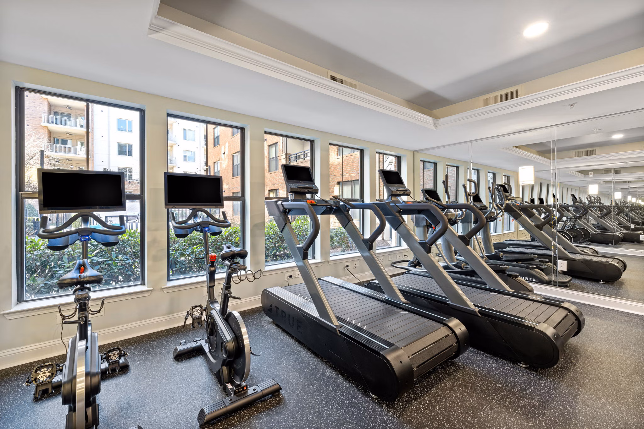 Fitness center with state-of-the-art equipment at Midtown Green Apartments, luxury living in an urban setting