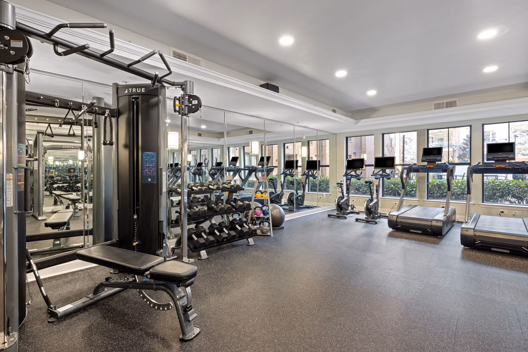 State-of-the-art fitness center with modern equipment at Midtown Green Apartments