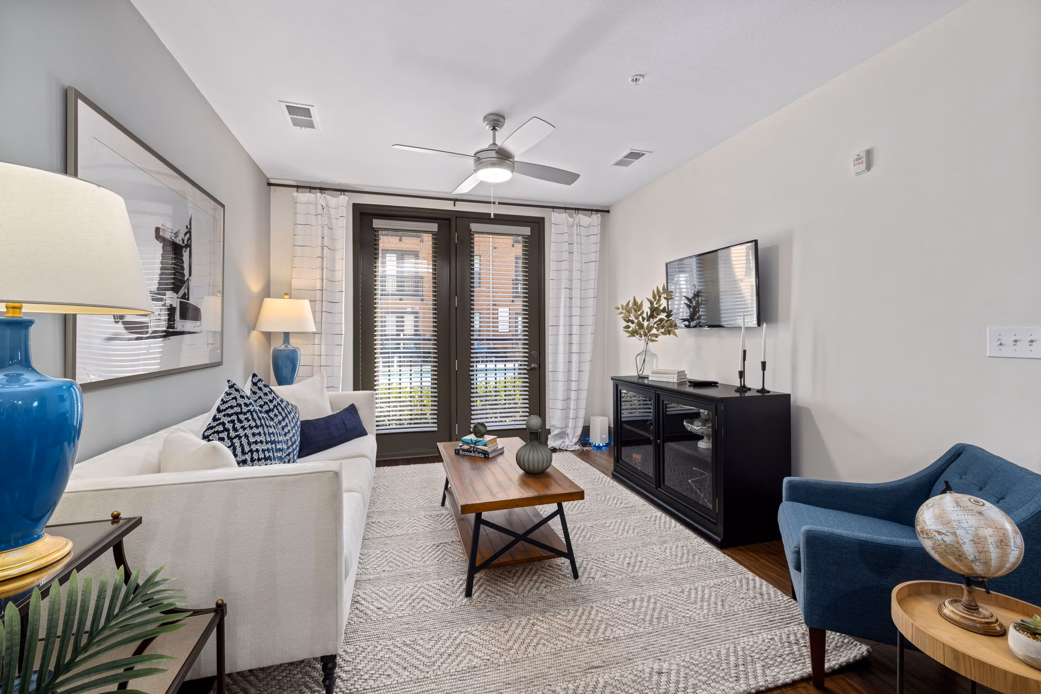 Modern living room with stylish furniture at Midtown Green Apartments, spacious design for luxury living in a prime location