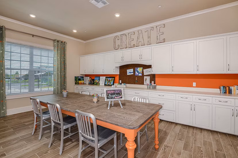Clubhouse featuring stylish seating and modern decor at The Retreat at Trinity Apartments