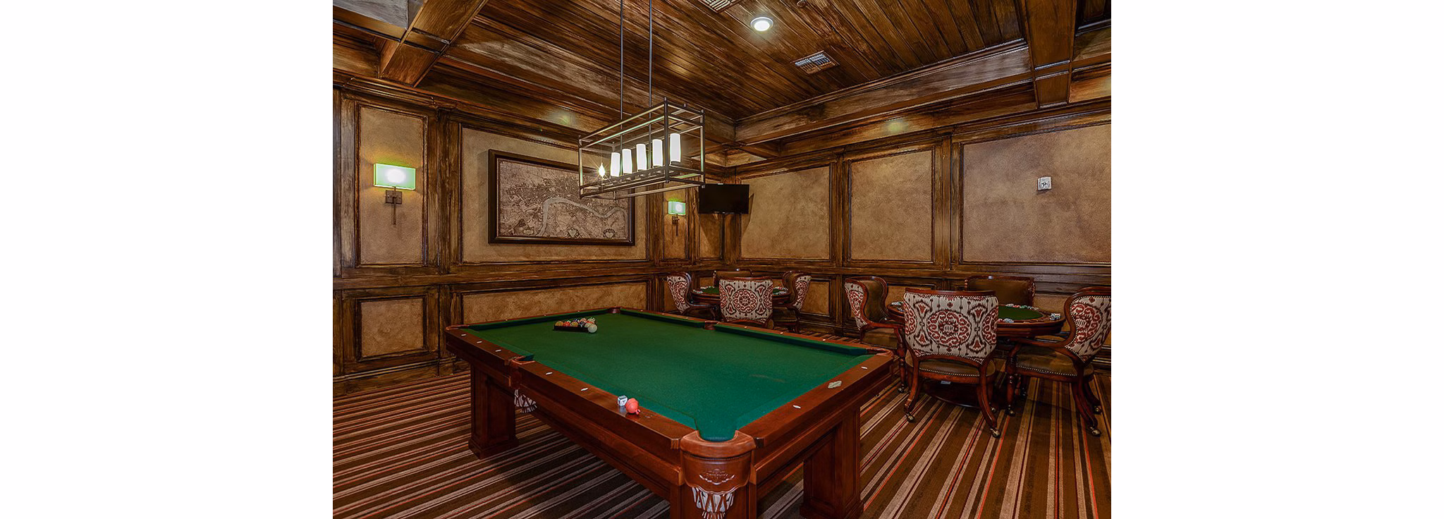 Vibrant game room with billiards table at The Retreat at Trinity Apartments