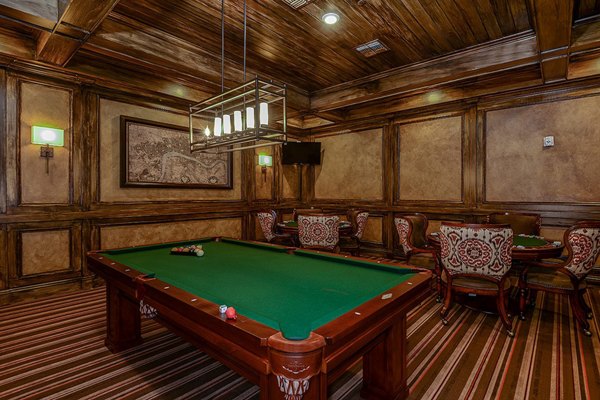 Vibrant game room with billiards table at The Retreat at Trinity Apartments