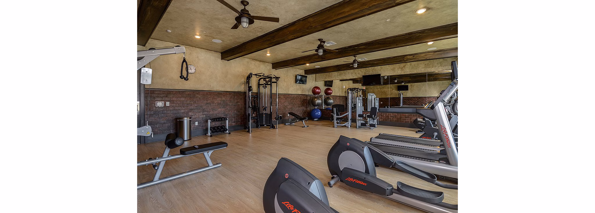 The Retreat at Trinity: State-of-the-art fitness center with modern equipment for residents to enjoy an active lifestyle