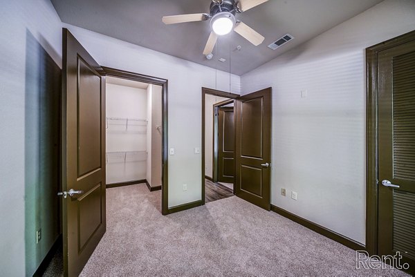 Modern bedroom with elegant decor in The Millennium Waterway luxury apartments