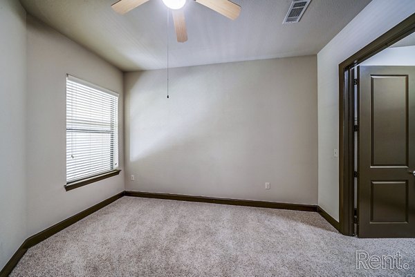 Luxurious bedroom featuring modern design elements at The Millennium Waterway apartments